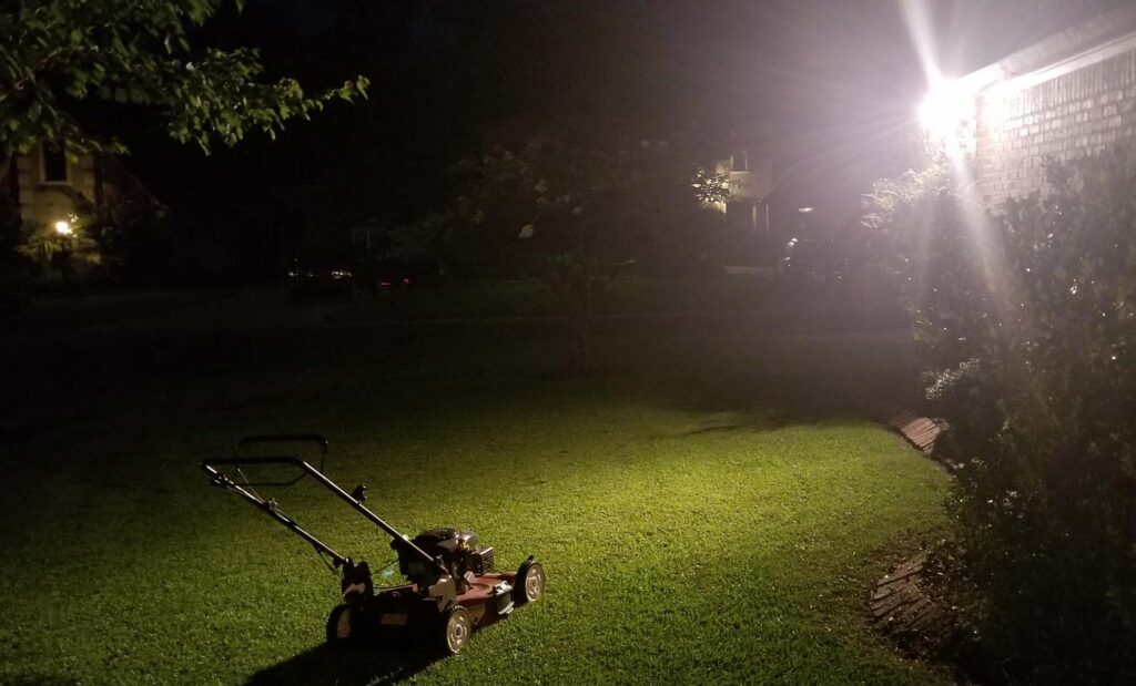 Mowing lawn at night