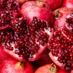 Close up of fresh harvested juicy pomegranate