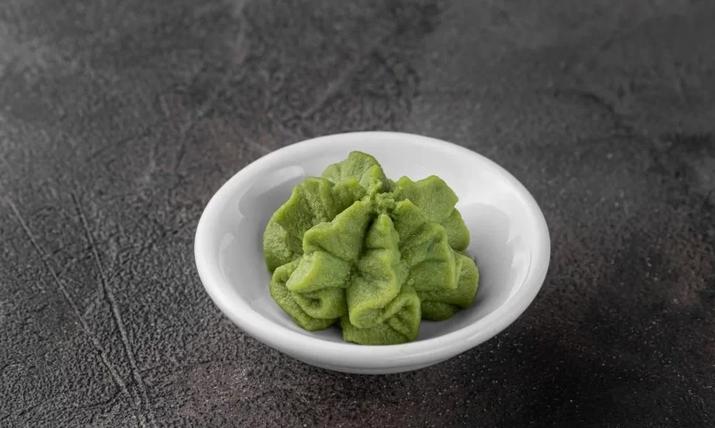 White ceramic bowl with a wasabi