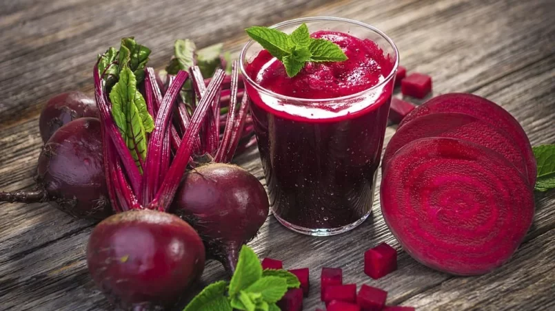 Beetroots with glass of beetroot juice