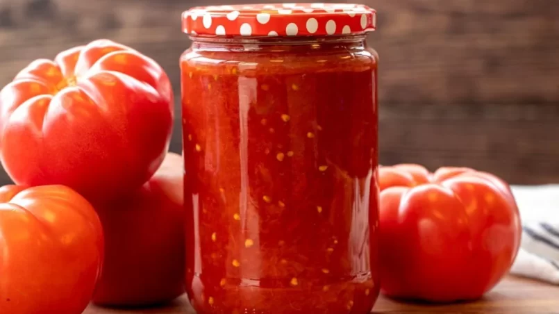 Canned tomato sauce in glass jar