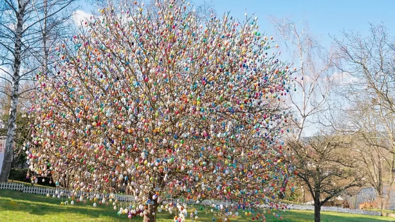 Colorful handmade Eastereggs on an apple tree