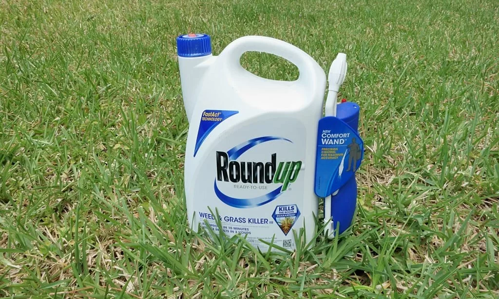 Roundup Weed and Grass Killer on a grass lawn