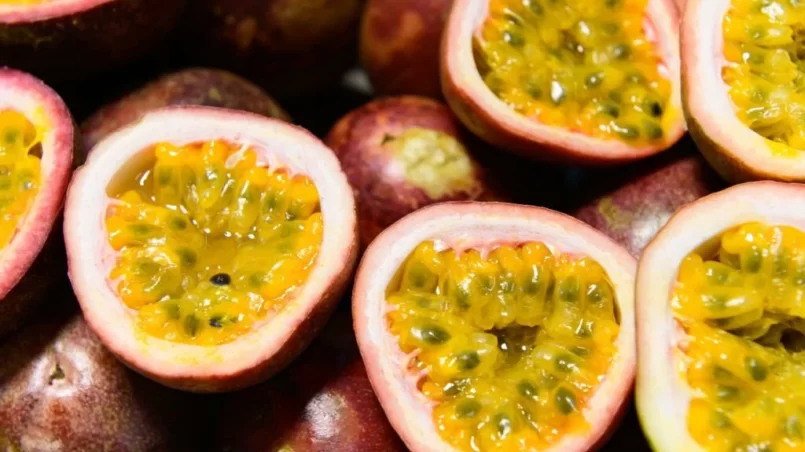 Group of passion fruits and its cross section with seeds